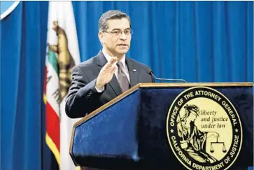  ?? Gary Coronado Los Angeles Times ?? CALIFORNIA ATTY. GEN. Xavier Becerra said at his swearing-in on Tuesday that he would form a united front with officials from other states to defend their policies against any federal challenges.