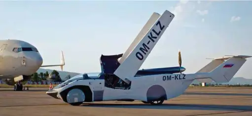  ??  ?? Klein Vision's AirCar, a dual-mode car-aircraft vehicle, successful­ly finished its first inter-city flight recently