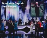  ??  ?? Duet with Captain Tom Moore