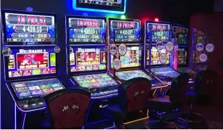  ?? ?? Slot machines in gambling hall