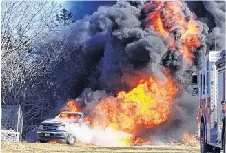  ??  ?? A spectacula­r truck fire on March 16 on Lakeside Road is suspected to have started from an electrical short caused by wires chewed by a squirrel. JESSE BERRY