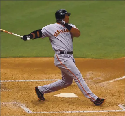  ?? JOSE CARLOS FAJARDO — STAFF FILE ?? The Giants’ Barry Bonds watches the flight of his 714th career home run to join Babe Ruth for second place on the career home run list.