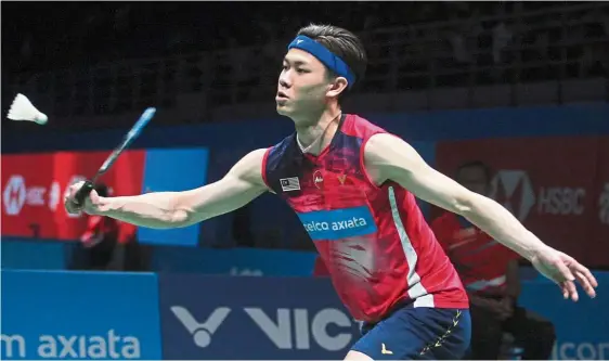  ??  ?? Early shower: Lee Zii Jia was handed a first-round defeat by Indonesia’s Anthony Ginting at the French Open yesterday.