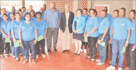  ??  ?? President David Granger and RHTY&SC Secretary/CEO Hilbert Foster with some of the club’s members