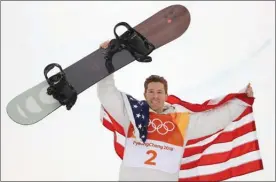  ?? The Associated Press ?? Gold-medal winner Shaun White of the United States celebrates following the men’s halfpipe final at the 2018 Winter Olympics in Pyeongchan­g, South Korea, on Tuesday night.