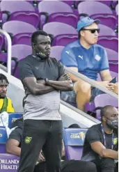  ??  ?? Jamaica’s Head Coach Theodore Whitmore looks on during the Concacaf Gold Cup football match between Guadeloupe and Jamaica at the Exploria Stadium in Orlando, Florida, on Friday.