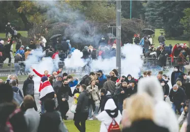  ?? BELAPAN VIA REUTERS ?? A stun grenade explodes in Minsk, Belarus, during an opposition rally on Sunday to reject election results.