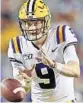  ?? MICHAEL DEMOCKER/AP ?? LSU quarterbac­k Joe Burrow (9) will lead the Tigers against Georgia in the SEC title game Saturday.