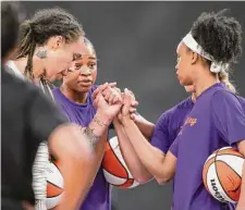  ?? Meg Oliphant/Getty Images ?? Turner and the Phoenix Mercury huddle before a 2021 game against the Los Angeles Sparks at Los Angeles Convention Center.