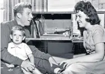  ?? ?? Grainger with his wife Doreen and their son listening to his latest record: his pop career had begun after his England teammate Nat Lofthouse got him up to sing to a bar full of journalist­s