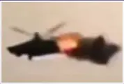  ?? ?? FINAL MOMENTS: The helicopter flies over Luhansk and is hit in the tail section, which causes a massive explosion that makes it spiral out of control