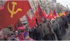  ??  ?? Marchers mark the 100th anniversar­y of the deaths of Rosa Luxemburg and Karl Liebknecht in Berlin on Sunday.