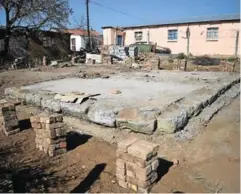  ??  ?? BUILDING A FAMILY LEGACY: The Xinishe family home in Mlungisi is being built from scratch after councillor Mncedisi Mbengo’s interventi­on