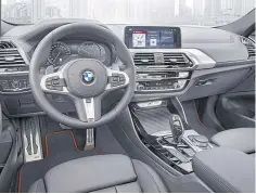  ??  ?? The X4’s interior is shared with the X3.