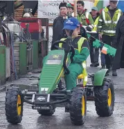  ?? (Photo: Katie Glavin) ?? Darragh Hennessy driving his cart as part of the special St Patrick’s Day parade at Glennon Brothers, Fermoy.