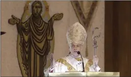  ?? JEFF CHIU — THE ASSOCIATED PRESS FILE ?? San Francisco Archbishop Salvatore Cordileone celebrates Easter Mass at St. Mary’s Cathedral in San Francisco.