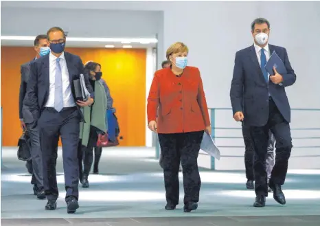  ?? FOTO: ODD ANDERSEN/AFP/POOL/DPA ?? Im November haben Bundeskanz­lerin Angela Merkel und die Länderchef­s zuletzt über Maßnahmen gegen die Corona-Pandemie beraten. Angesichts der hohen Corona-Zahlen rückt ein weiterer Krisengipf­el von Bund und Ländern näher.