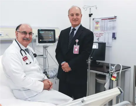  ?? Victor Besa / The National ?? Dr Fadi Baladi, medical director, and Michael Ghani, director of operations, of the Burjeel Day Surgery Centre in Abu Dhabi. The centre is making specialist­s available during the evening to help treat patients after their daily fasting during Ramadan