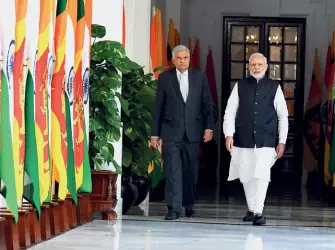  ??  ?? COMMON AGENDA Ranil Wickremesi­nghe with PM Narendra Modi in New Delhi on October 20