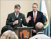  ?? FELICIA FONSECA/AP ?? National Park Service head Mike Reynolds, left, and Interior Secretary Ryan Zinke vowed to address the problem.