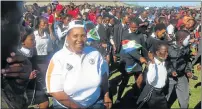  ?? Picture: YOLISWA SOBUWA ?? MACARENA RECORD: Sport, recreation, arts and culture executive director Noxolo Nqwazi joins thousands of dance fans at Wolfson Stadium yesterday