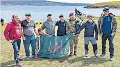  ?? ?? Veterans and family of those who were killed in the Falklands conflict visit the islands