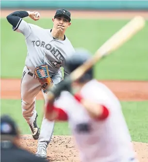  ?? OMAR RAWLINGS/GETTY IMAGES ?? Aaron Sanchez and the Blue Jays kept it close until the bottom of the fourth, when the wheels came off and the Red Sox scored five. Sanchez went winless in May.