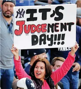  ?? [AP PHOTO] ?? Yankee fans are believing that rookie slugger Aaron Judge and New York can advance to the World Series with a win over Houston on Friday night at Minute Maid Park. New York has won three straight in the best-of-7 series.