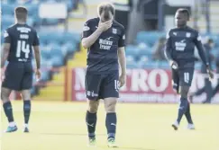  ??  ?? 0 Dundee’s Paul Mcgowan hangs his head at full-time on Saturday.