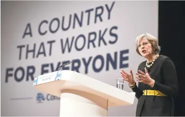  ?? OLI SCARFFOLI SCARFF/AFP/GETTY IMAGES ?? Britain’s Prime Minister Theresa May speaks Sunday in Birmingham, central England, about leaving the European Union.