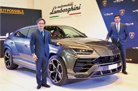  ??  ?? Chye (left) and Lamborghin­i area manager (Southeast Asia) Davide Sfrecola unveiling the Urus super SUV in Kuala Lumpur.