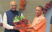  ?? HT PHOTO ?? Chief Minister Yogi Adityanath welcoming NDA’s presidenti­al candidate Ram Nath Kovind in Lucknow on Sunday.