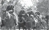  ?? The College Station Eagle via AP ?? Members of Parsons Mounted Cavalry leave their staging area on Oct. 7 at Spence Park before a football game between Texas A&M and Alabama at Kyle Field in College Station, Texas.