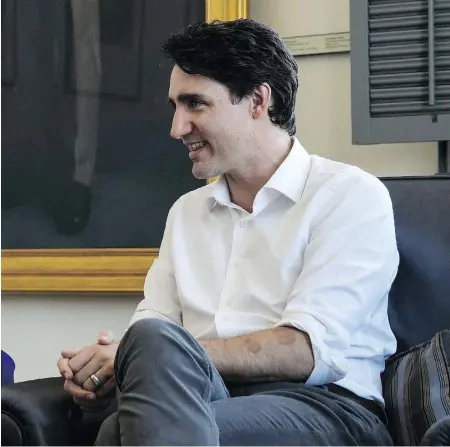  ?? ADAM SCOTTI / PMO ?? Prime Minister Justin Trudeau was photograph­ed recently with two circular reddish bruises on his left forearm.