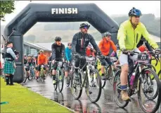  ?? Photo by PhotoGnick Arran ?? Piper Andrew Earle pipes the cyclists off at the start of a race last year.