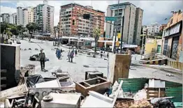  ?? ARIANA CUBILLOS/AP ?? A barricade in Petare neighborho­od is erected by anti-government protesters Saturday.