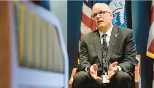  ?? PATRICK SEMANSKY/AP ?? U.S. Customs and Border Protection Commission­er Chris Magnus speaks during a February interview in his office.