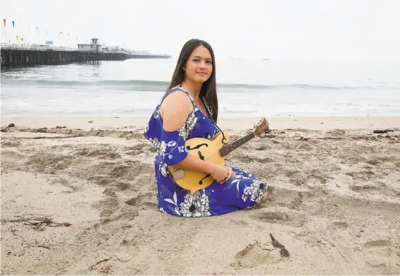  ?? Liz Hafalia / The Chronicle ?? AJ Lee of Santa Cruz will perform on the California Bluegrass Associatio­n’s first float entry in a Pride Parade in San Francisco on Sunday, June 25.