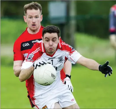  ??  ?? Aaron O’Boyle of Coolera/Strandhill in action with St Mary’s Mark Breheny in Connolly Park on Sunday in the Belfry Senior Football Championsh­ip quarter final. Pics: Tom Callanan.