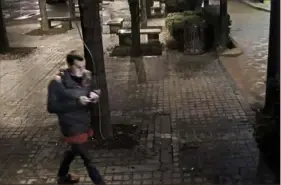  ?? Pittsburgh police ?? Dakota James is seen in a still from a surveillan­ce camera video walking in Katz Plaza, Downtown, shortly before midnight Jan. 25, 2017. It was the last known sighting of Mr. James, whose body was found in the Ohio River in Robinson on March 6, 2017.