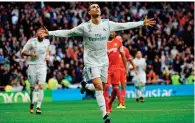  ?? AFP ?? Real Madrid’s Cristiano Ronaldo celebrates a goal against Sevilla during a La Liga match at the Santiago Bernabeu. —