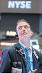  ?? GETTY IMAGES/AFP ?? A trader reacts as he works on the floor of the New York Stock Exchange (NYSE) on Wednesday.