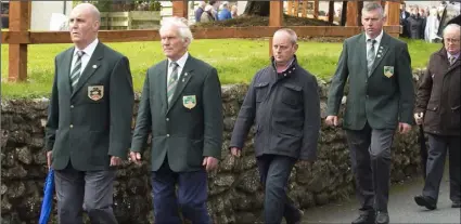  ??  ?? Members of the National Ploughing Associatio­n providing a guard of honour at the funeral of Martin Kehoe Jnr.