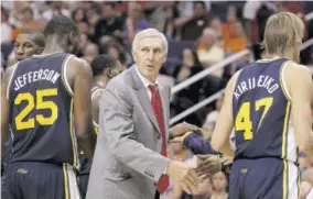  ?? (Photo: AFP) ?? Head Coach Jerry Sloan of the Utah Jazz talks with his team during the preseason NBA game against the Phoenix Suns in Phoenix, Arizona, in this October 12, 2010 file photo.