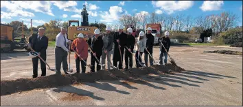  ?? AMY LAVALLEY/POST-TRIBUNE ?? Porter County officials participat­e in a ceremonial groundbrea­king Tuesday for an auxiliary building next to the North County Government Complex that will include Portage Township offices, including the township food pantry.