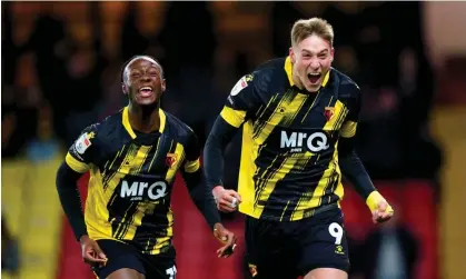  ?? ?? Mileta Rajović (right) celebrates scoring Watford’s second goal in their victory over Norwich. Photograph: Adam Davy/PA