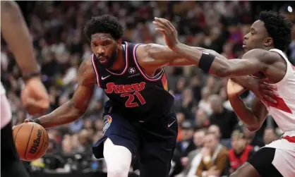  ?? Photograph: Frank Gunn/AP ?? Joel Embiid’s game-high 33 points lifted the Philadelph­ia 76ers to a series-clinching win over the Toronto Raptors on Thursday night.