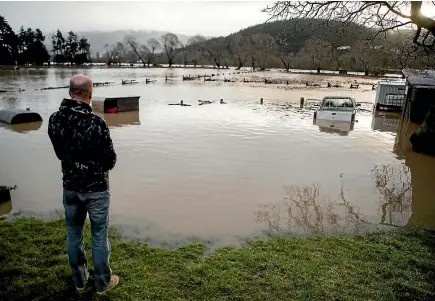  ?? PHOTO: GEORGE HEARD/STUFF ?? Flooding in the South Island led to states of emergency being declared in Otago and Canterbury. Damages came to $31.2 million.