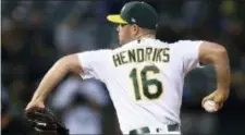  ?? THE ASSOCIATED PRESS ?? Oakland Athletics pitcher Liam Hendriks works against the Los Angeles Angels during a game in September.
