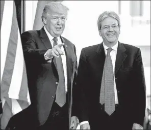  ?? AP/ ANDREW HARNIK ?? President Donald Trump greets Italian Prime Minister Paolo Gentiloni as he arrives Thursday at the West Wing of the White House.